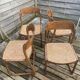 4 magnificent Baumann sled chairs, with caning.