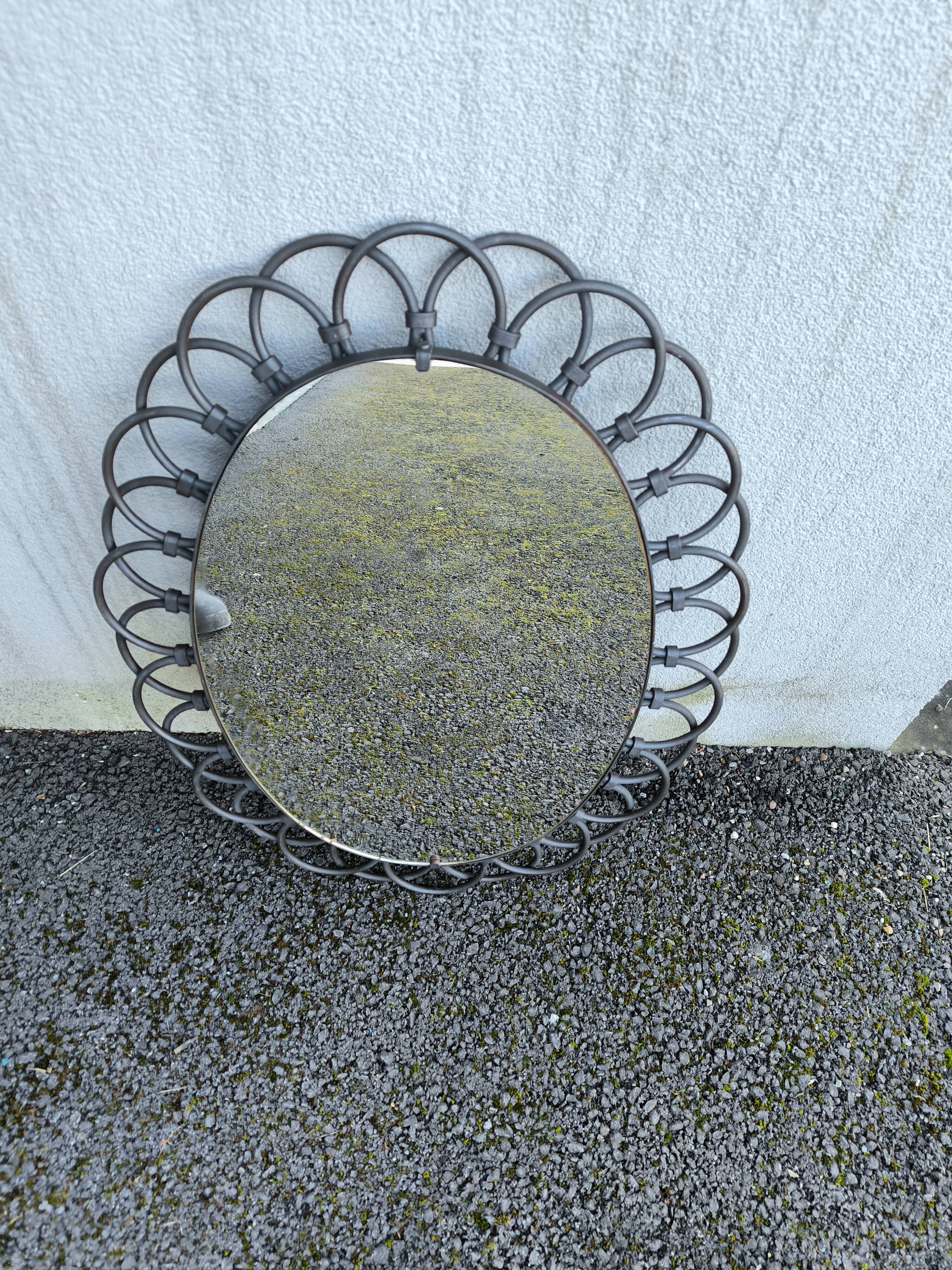 Oval metal mirror