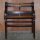 Antique entrance bench by Jas Shoolbred with brass fittings and walnut frame circa 1890.
