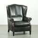 Black cowhide wingback armchair in classic English style