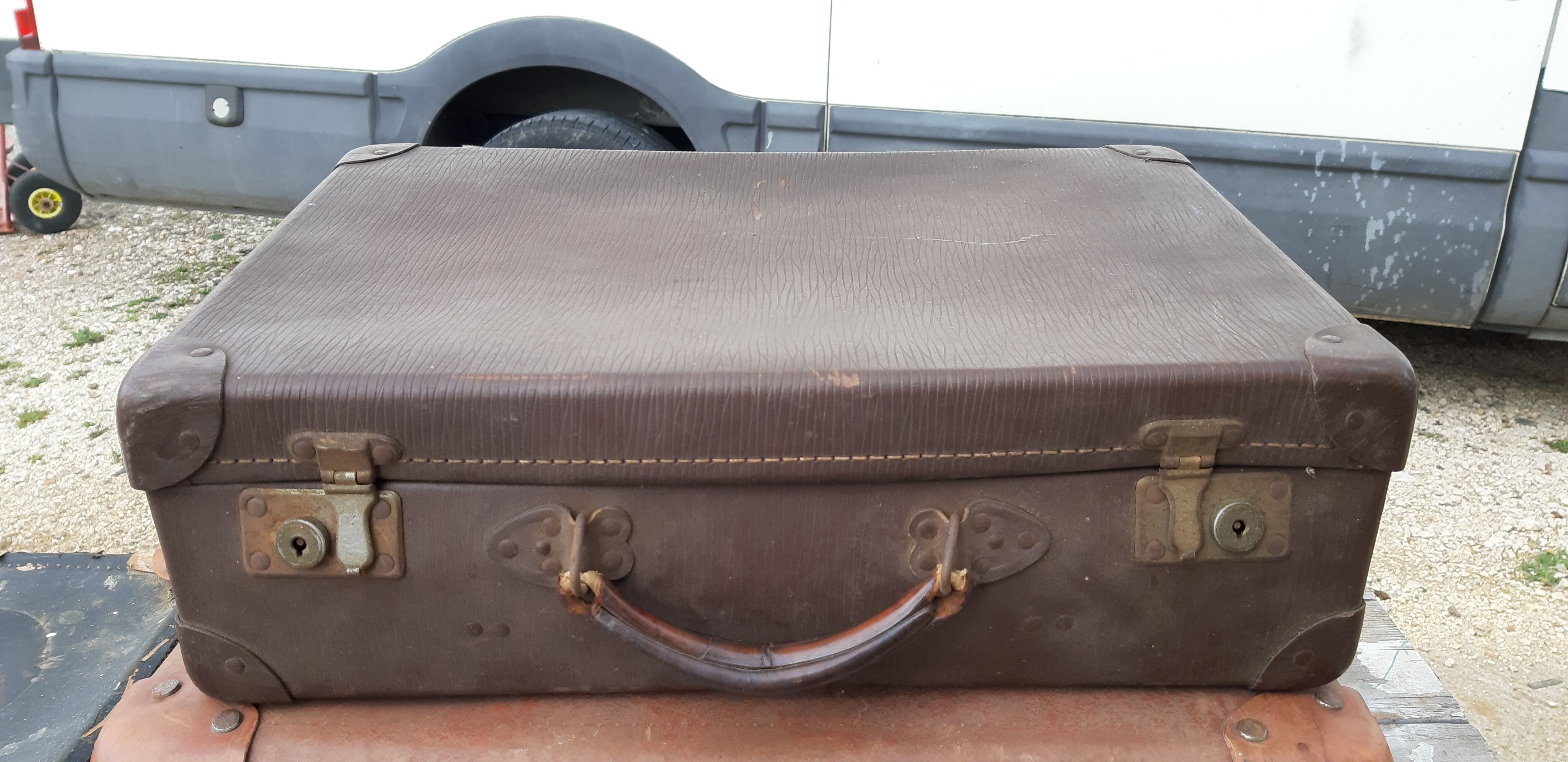 3 vintage suitcases