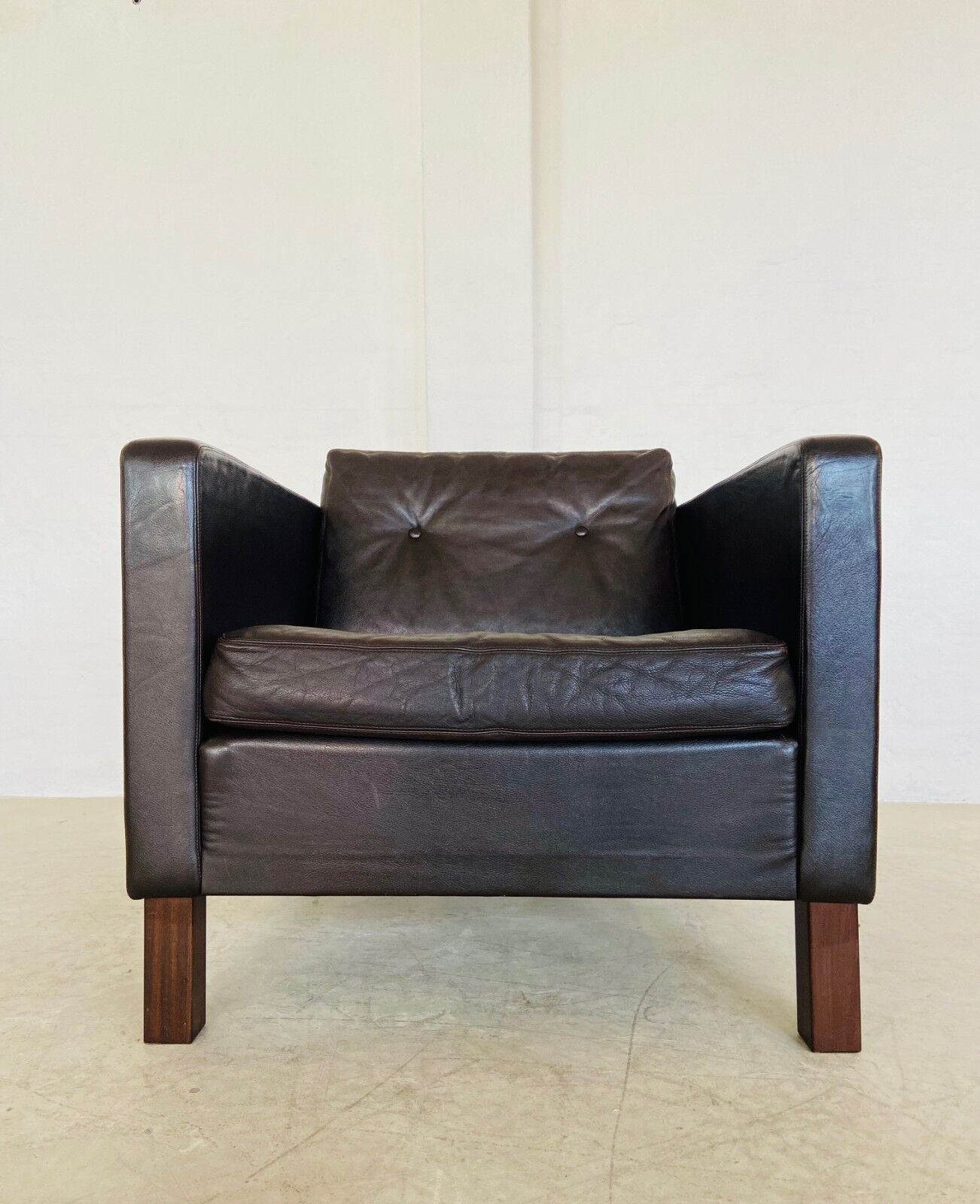 Vintage retro Danish club chair in brown leather by Erik Jørgensen