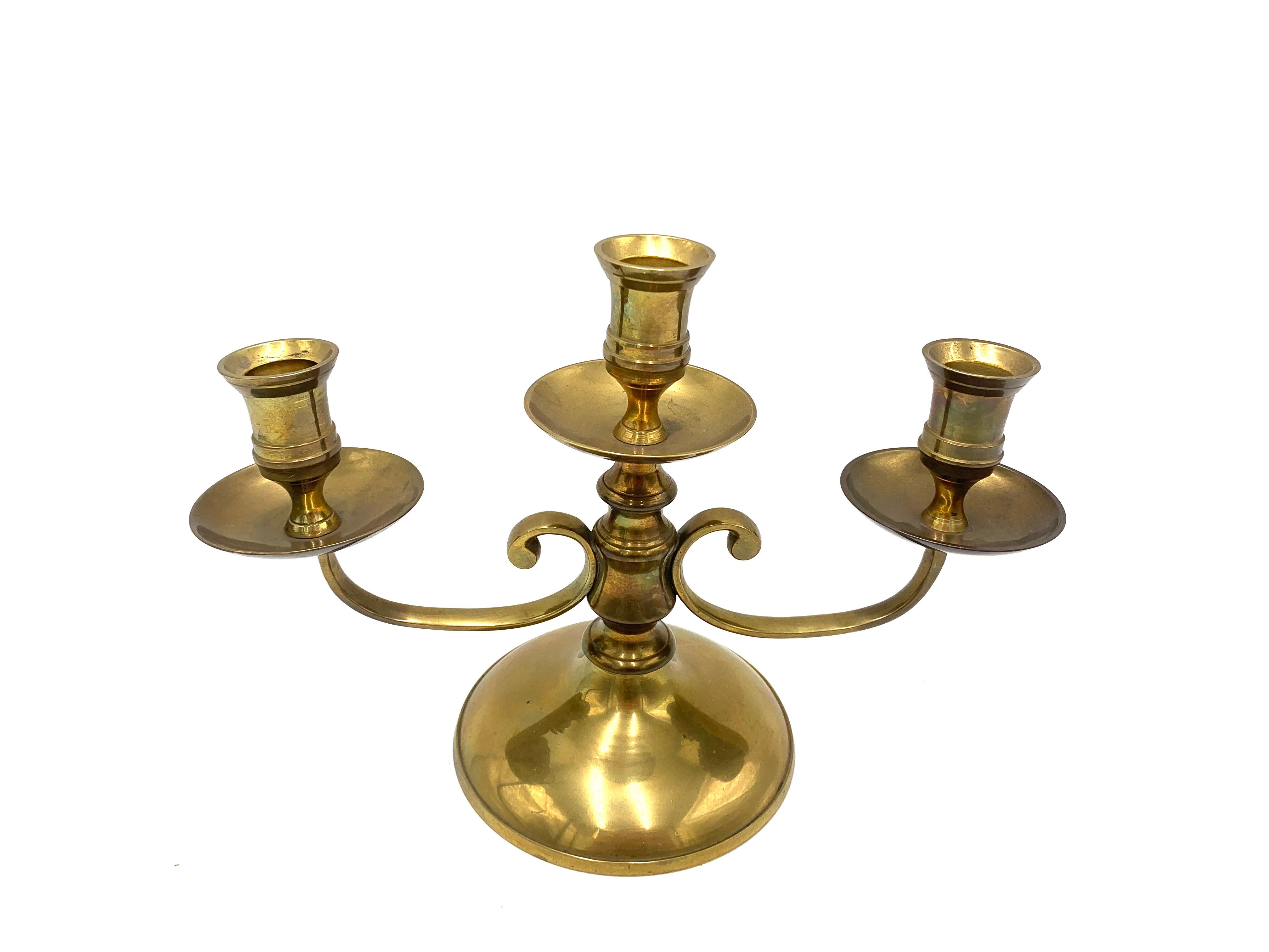 Brass three-arm candlestick