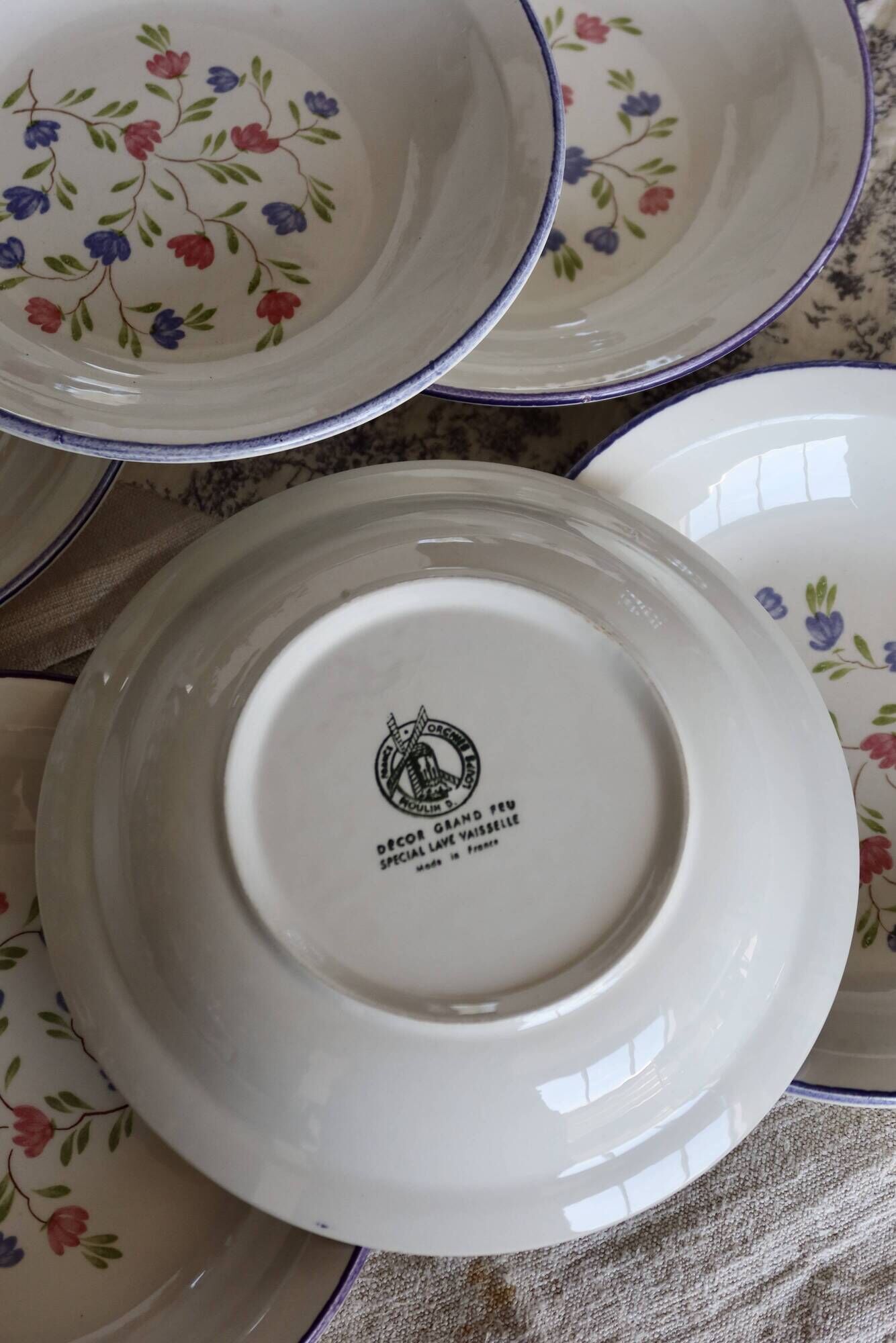 6 vintage porcelain Moulin des Loups soup plates with lilac floral pattern