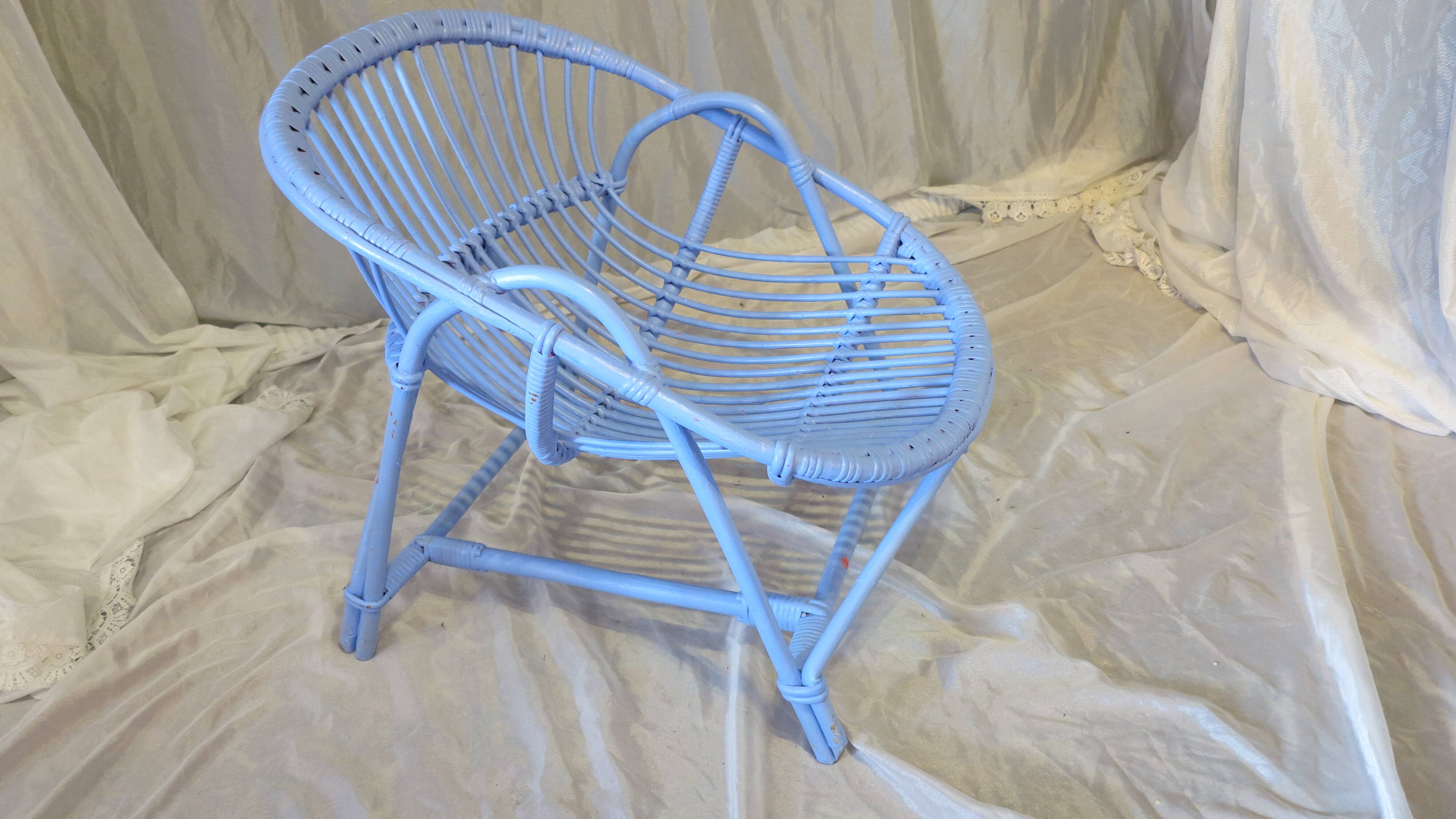 Blue painted rattan armchair