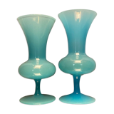 Two vases on a pedestal in blue opaline