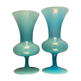 Two vases on a pedestal in blue opaline
