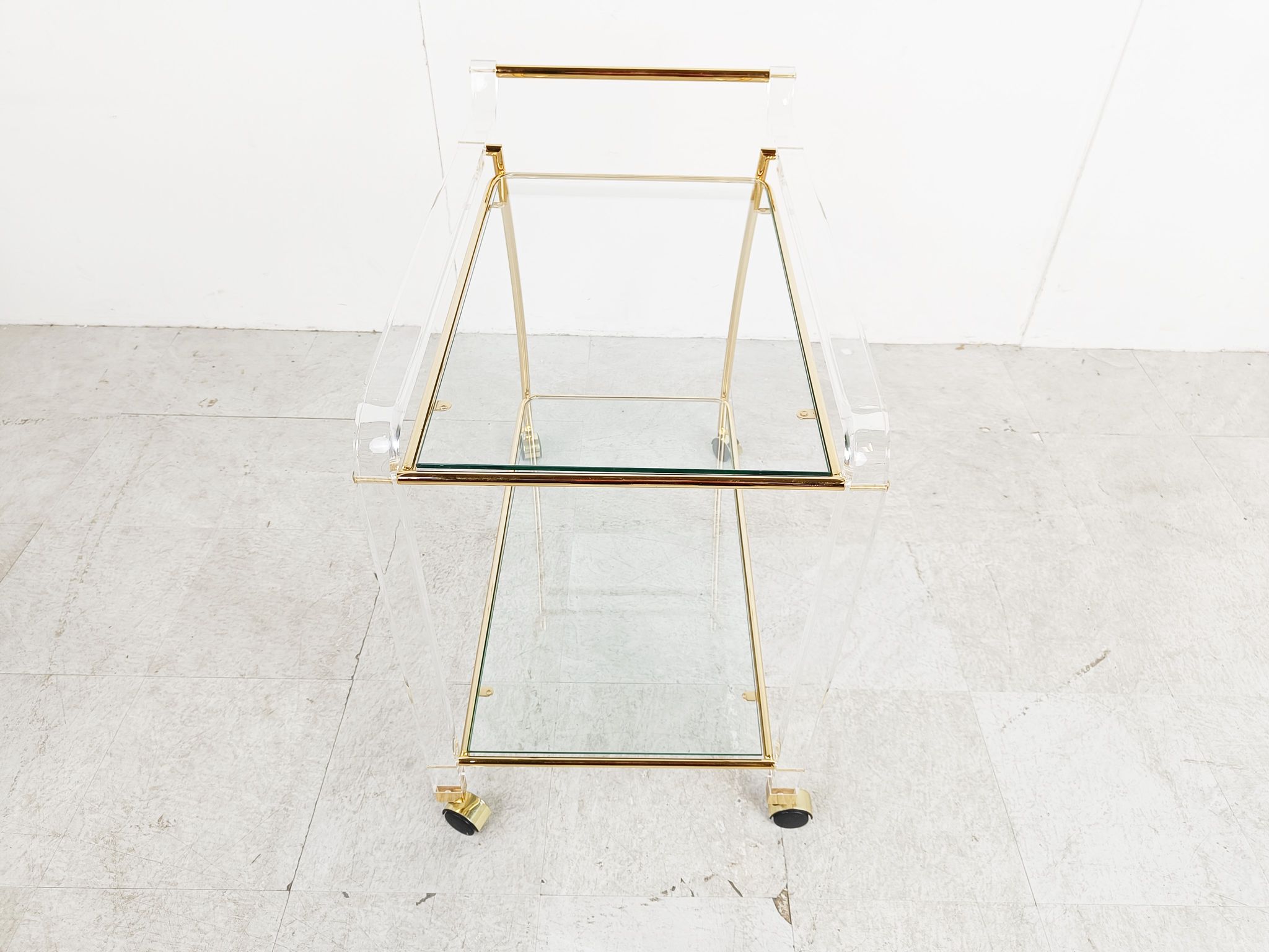 Brass and lucite drinks trolley, 1970s