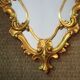 Louis XV-style gold-framed mirror 45x71cm
