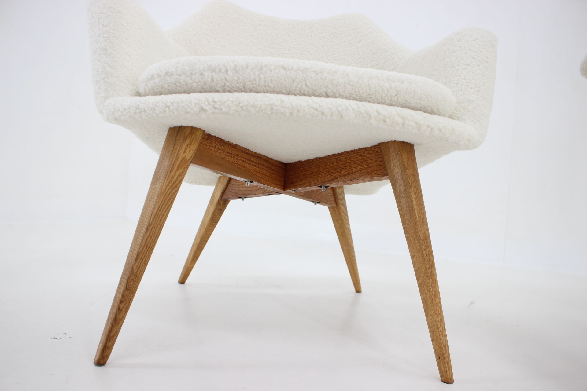Pair of miroslav navratil shell lounge chairs in sheepskin fabric, czechoslovakia, 1960