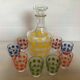 Liqueur service with multicoloured polka dot patterns.