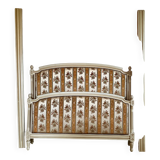 Louis XVI style bed in patinated wood with fluted columns.