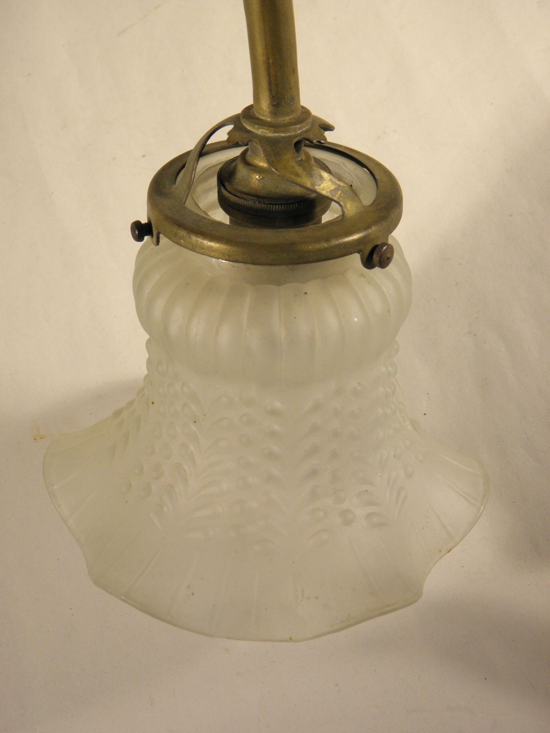 Three-spoke brass and glass chandelier