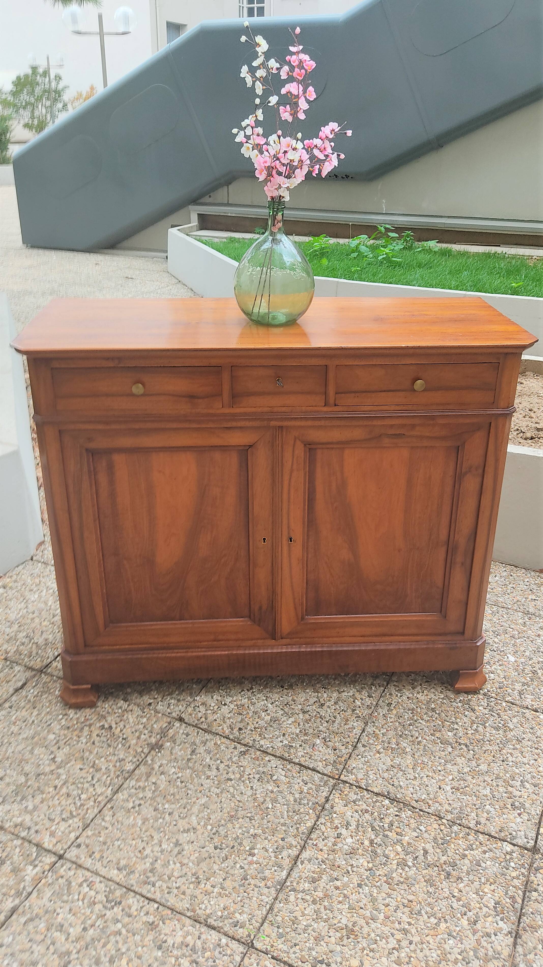 Solid walnut sideboard of the Napoleon III period, late nineteenth century, Louis Philippe style