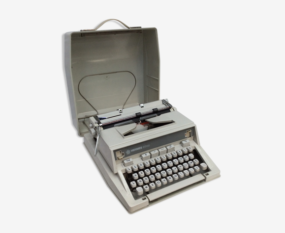Machine à écrire portable Hermès 3000 couleur gris avec sa valise dimension : h-13,5 cm- l-33cm-