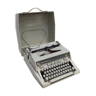 Portable typewriter Hermès 3000 color gray with its suitcase dimension: h-13,5 cm- l-33cm-