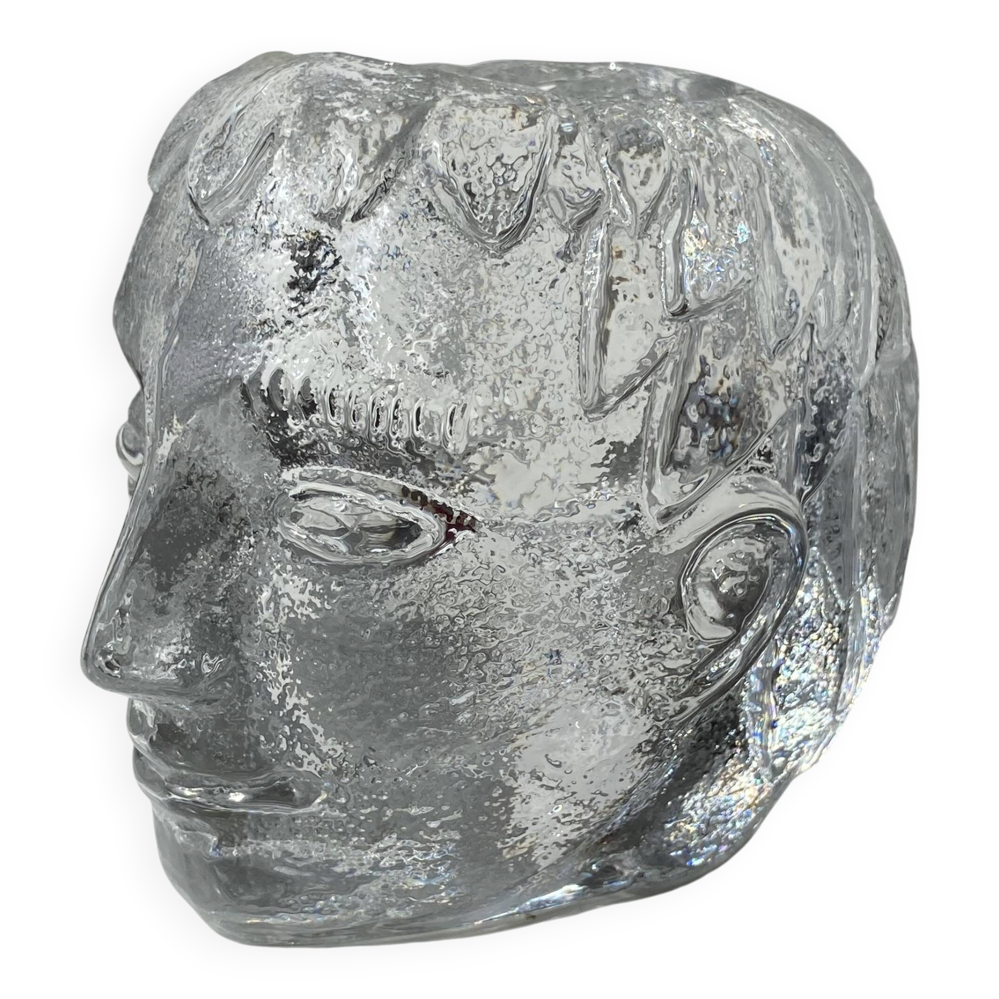 Glass candlestick by Bertil Vallien for Kosta Boda, man's head.