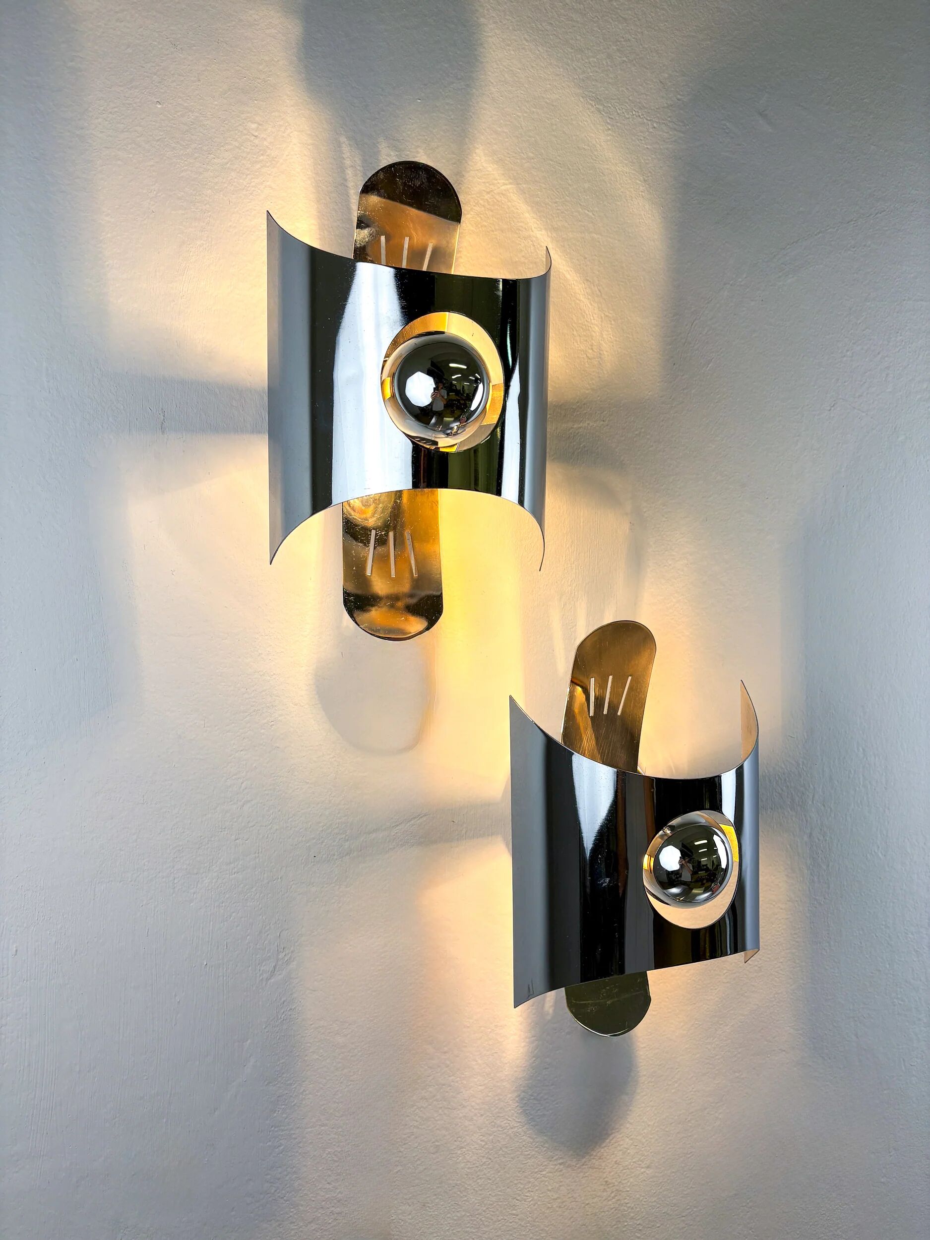 Pair of chromed space age wall lights, Italy, 1970s