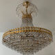 Chandelier cascade of tassels and brass
