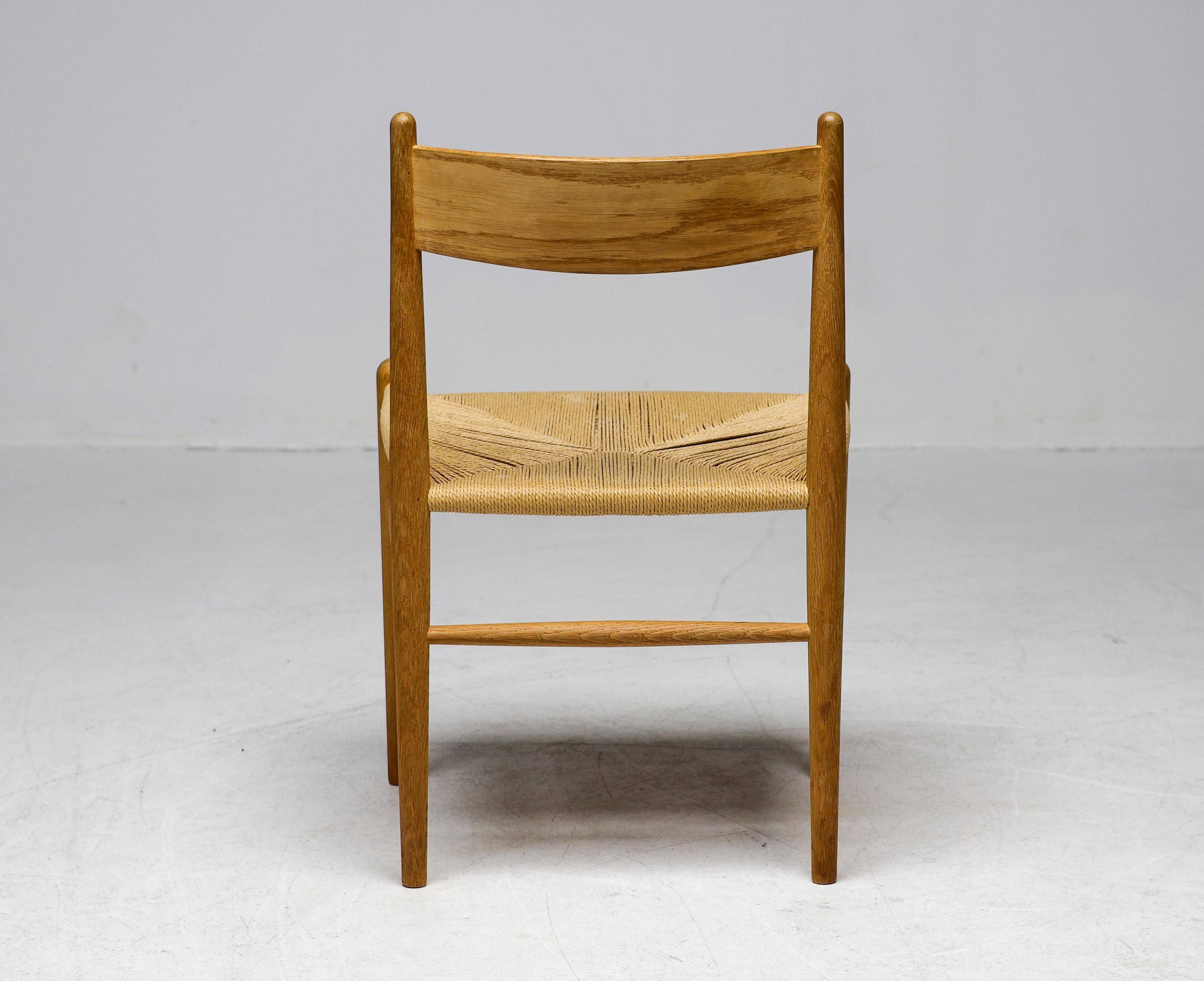 CH36 dining chair, matched, in soap-treated oak by Hans J. Wegner for Carl Hansen.