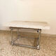 Coffee table in chromed rod