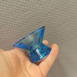 Two small candle holders in blue glass from the well-known Finnish company Ittala.