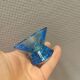 Two small candle holders in blue glass from the well-known Finnish company Ittala.