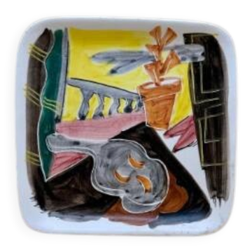 Decorative ceramic plate with enamel decoration
