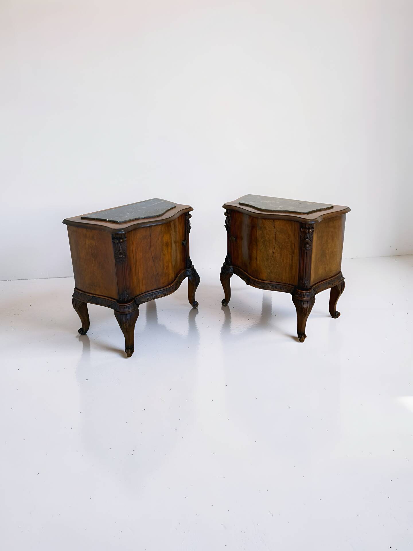serpentine nightstands in walnut Art Deco