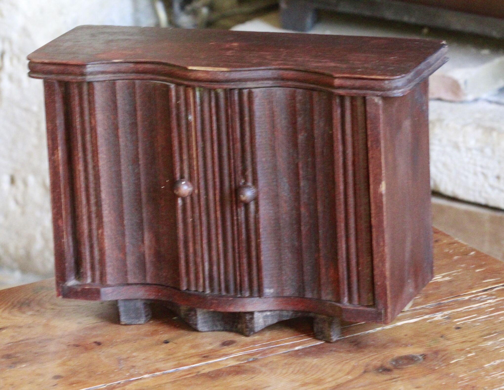 Old wooden doll sideboard