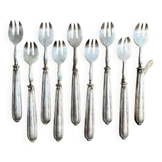 9 silver dessert forks, oyster forks