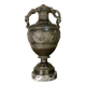Bronze vase with snakes and a green patina, in the antique style.