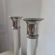 Pair of lucite and silver-plated candlesticks