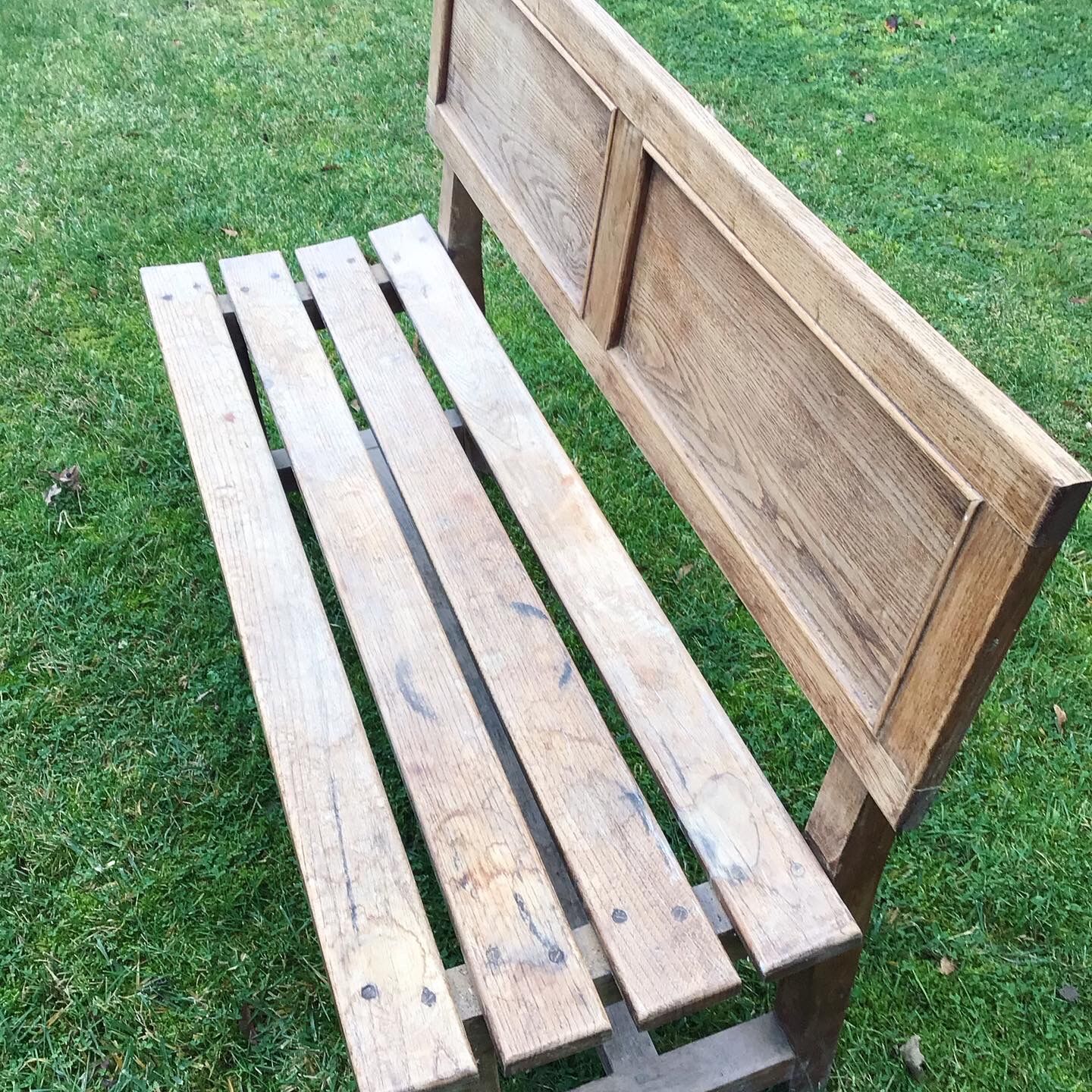 Wooden bench with back