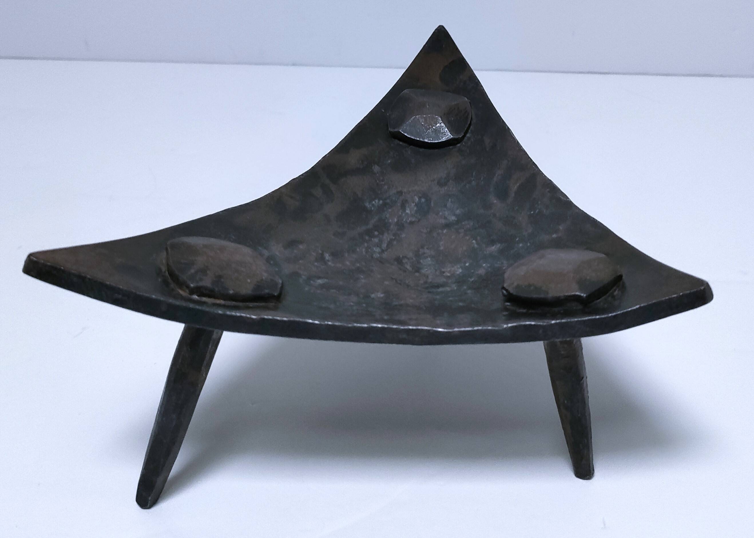 Brutalist metal pocket with patinated tripod