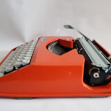 Hermes Baby orange typewriter, portable, functional