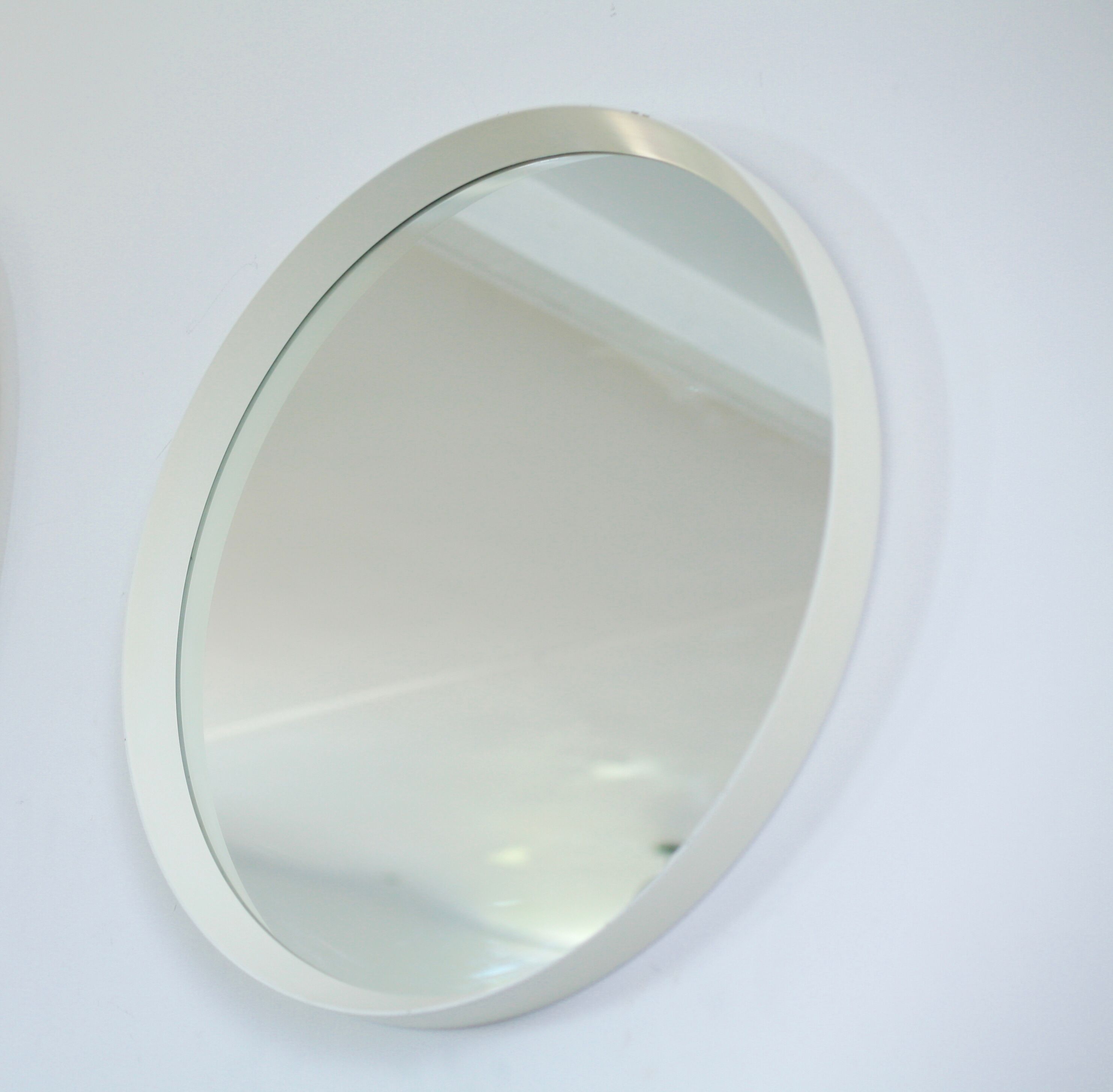 Circular mirror in "cream" laqué wood France circa 1960 68cm