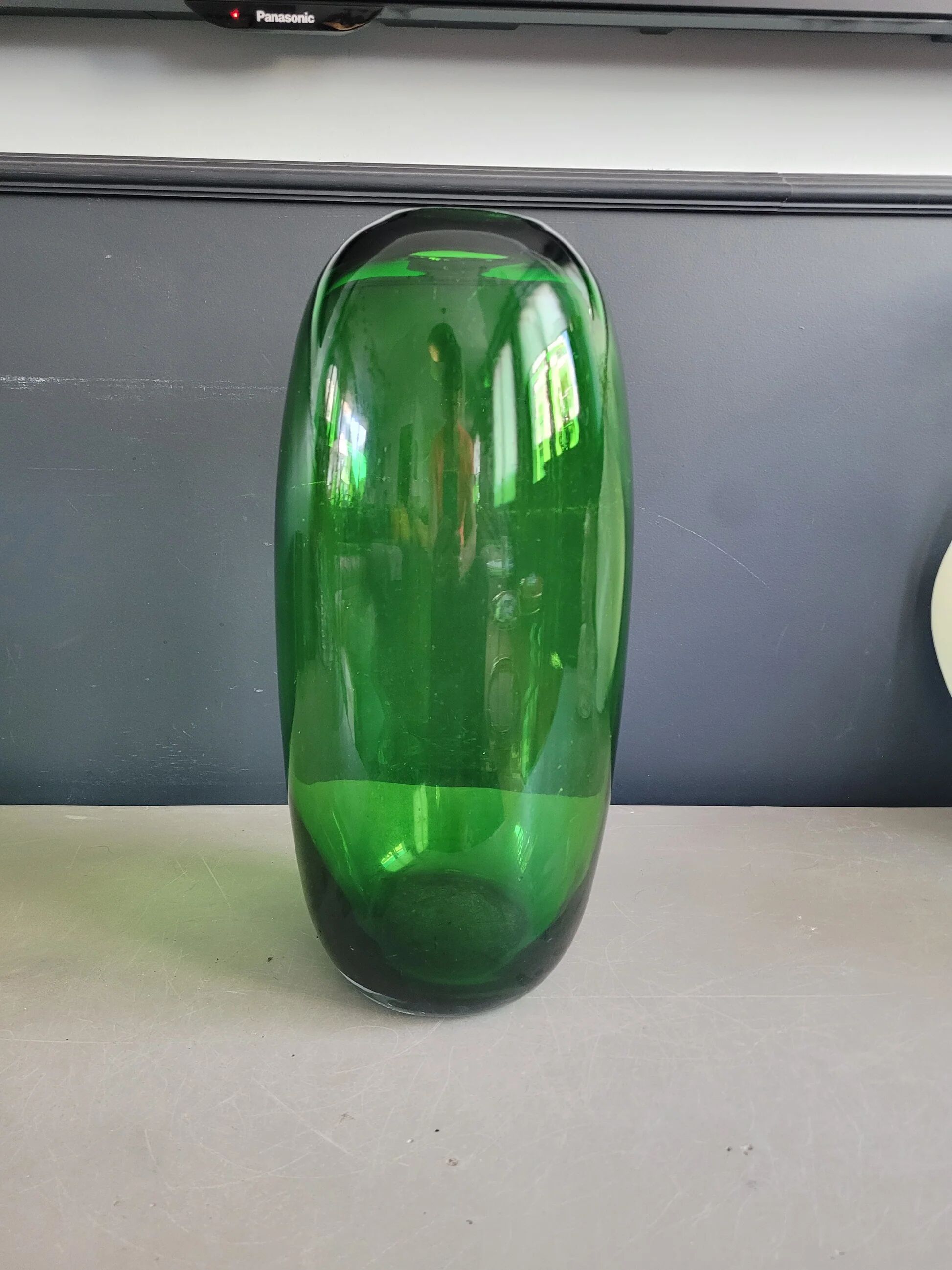 Large green glass vase