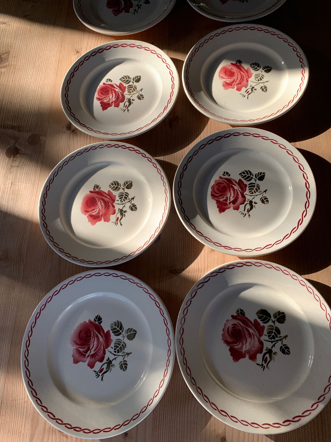 Set of 12 Badonvillier Germaine flat plates