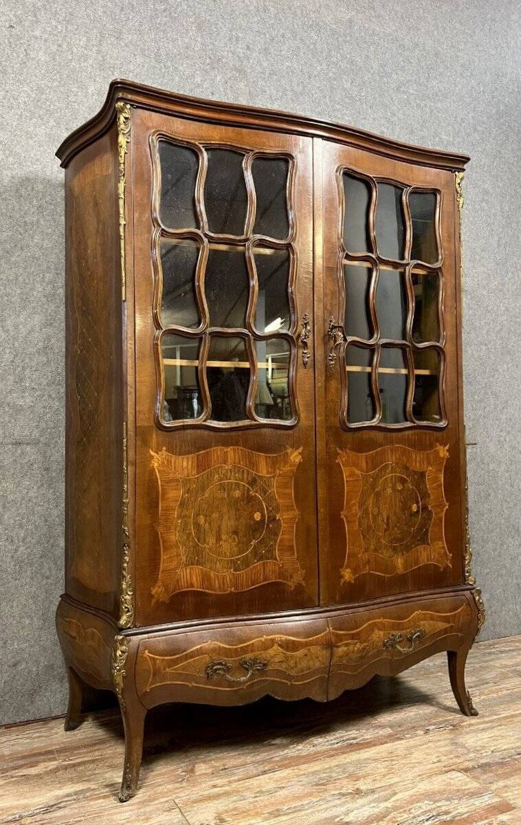 Louis XV style curved bookcase in precious wood marquetry