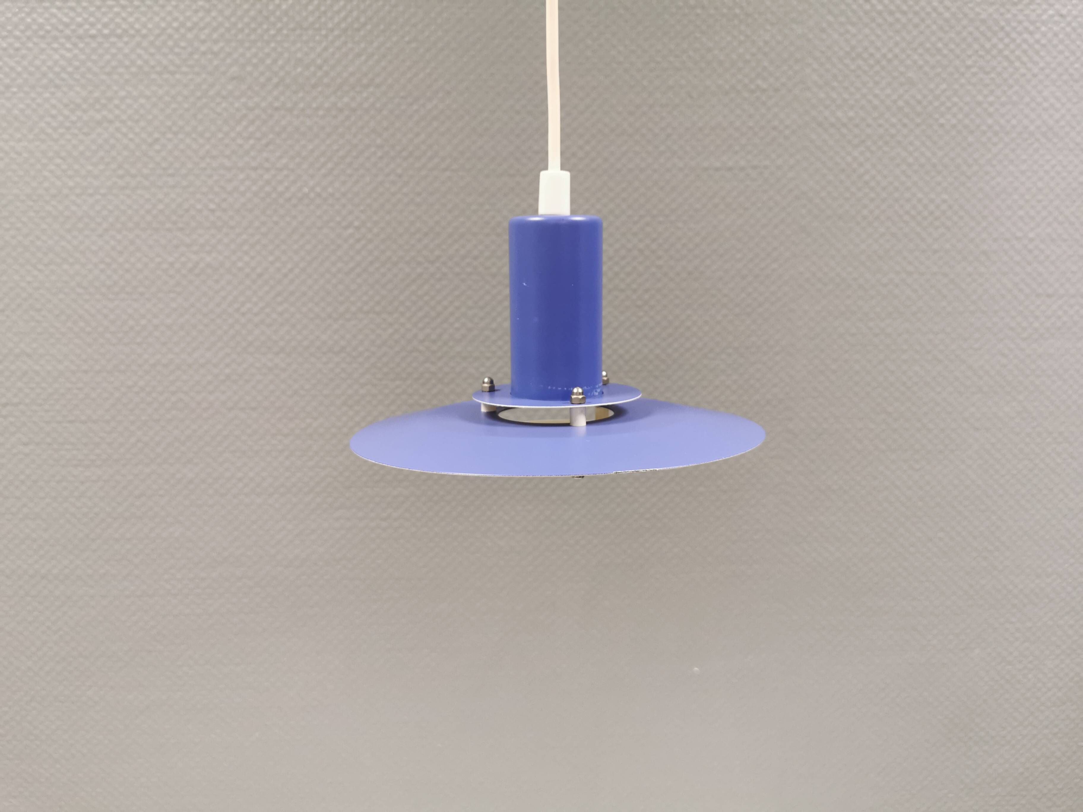 A blue minimalist hanging lamp from Lyfa Denmark 1980s.