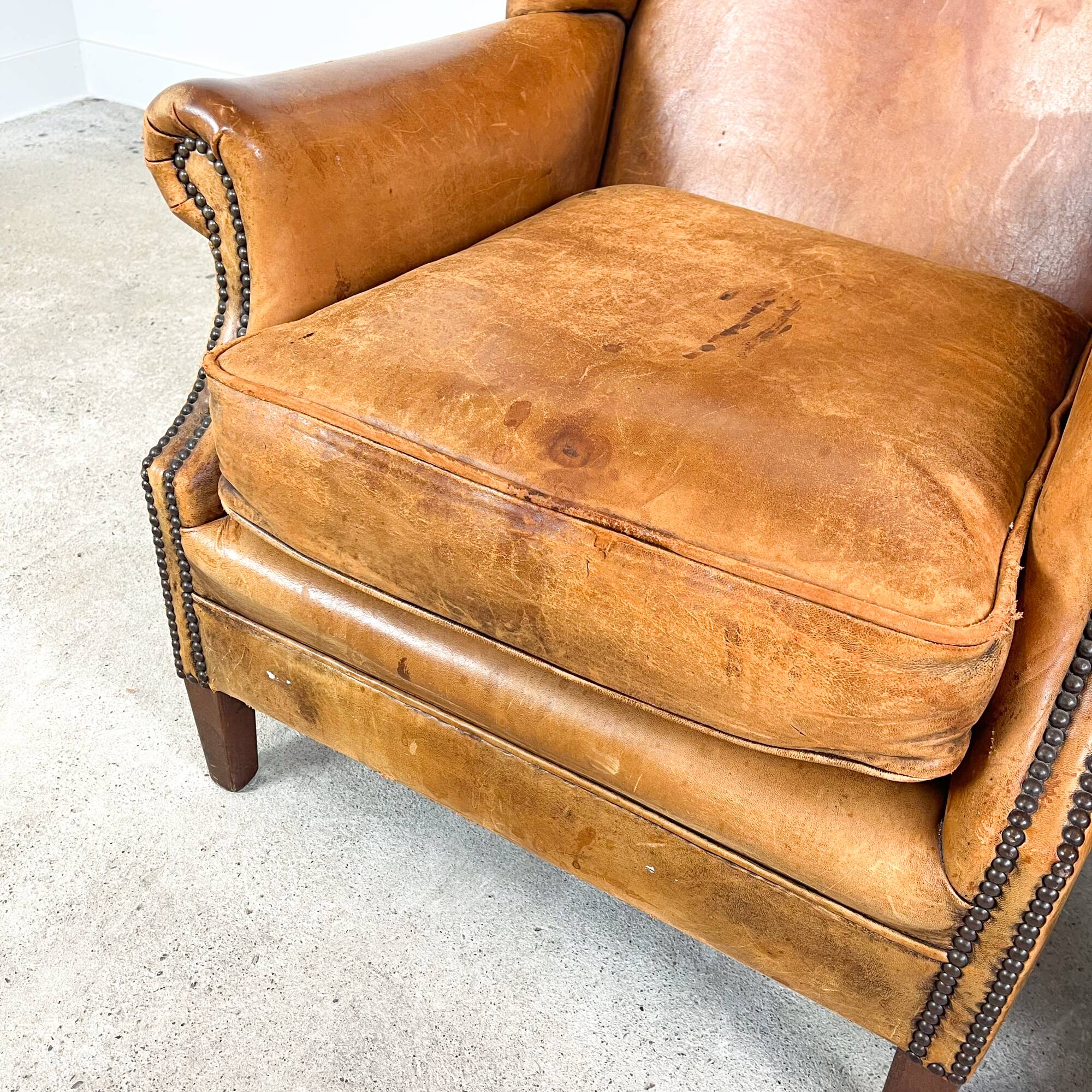 Set of two sheep leather wingback armchairs Delft