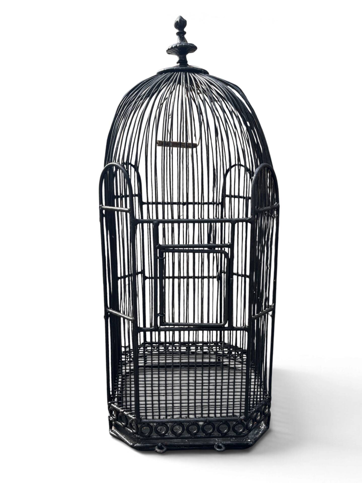 Old black metal birdcage from the early 20th century.