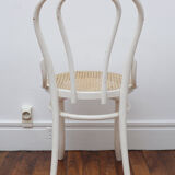 White wooden chair with cannage