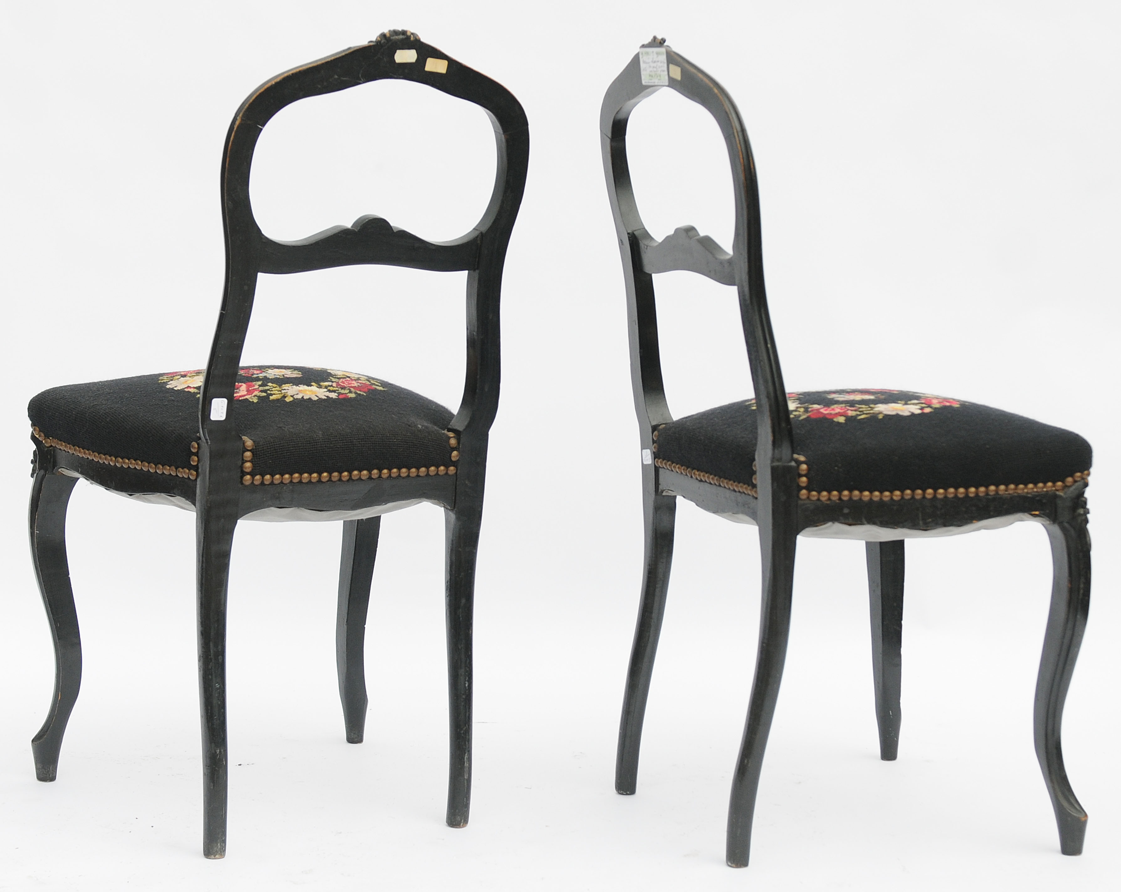 Pair of black Louis XV-style chairs