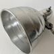 Old industrial wall light with counterweight.