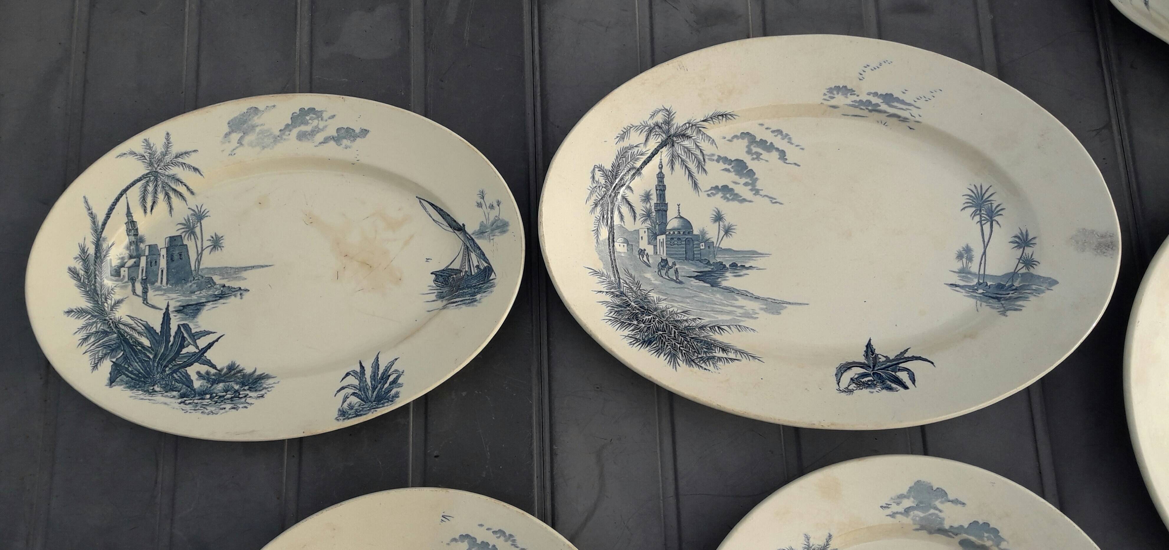 Gien earthenware service, Vues d'Orient model, 21 pieces, late 19th century
