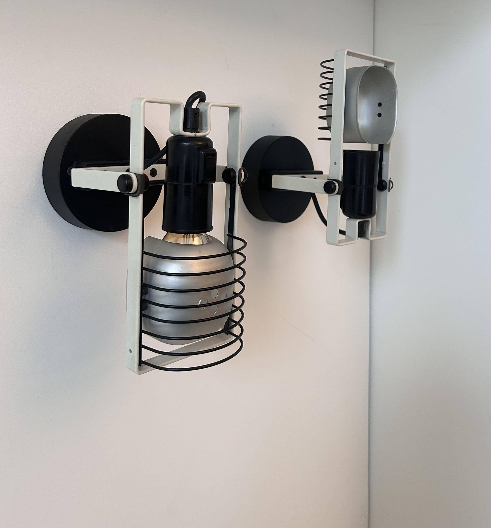 Pair of vintage Sintesi adjustable wall lights, by Gismonti for Artemide, Italy 1975