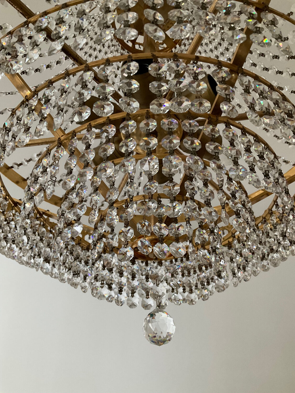 Brass chandelier and crystal tassel waterfall