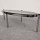 Oval smoked glass coffee table from the 60s/70s